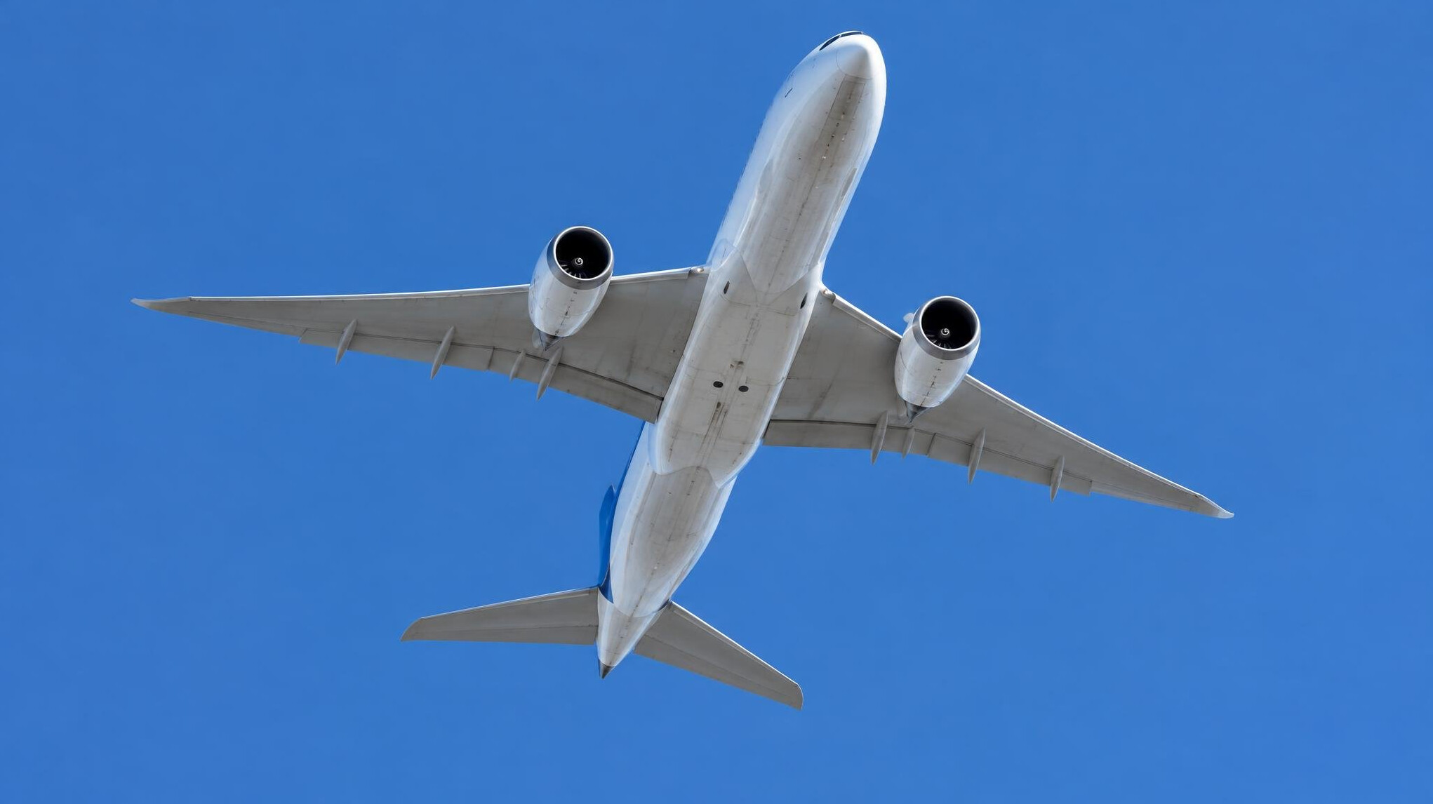 Airplane flying in a blue sky